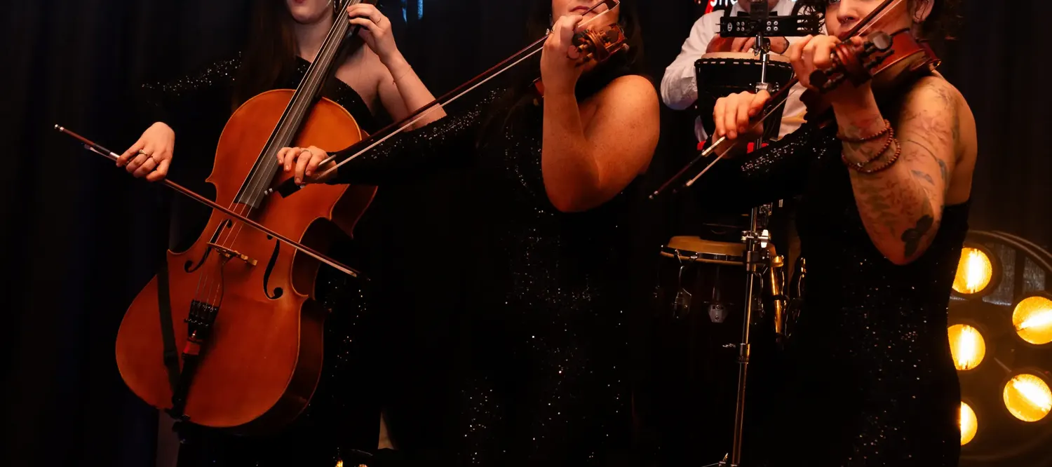The string section performing