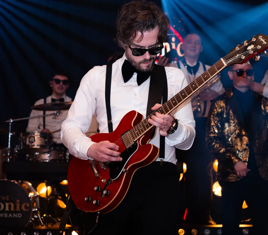 Guitarist playing a semi-hollow electric